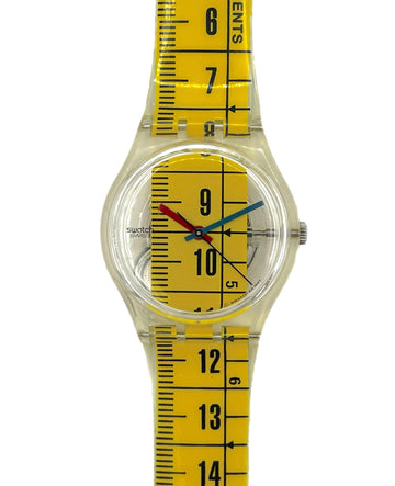 Wristwatch with a yellow ruler design on the strap against a white background