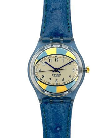 Swatch watch with blue strap and yellow and blue face on a white background