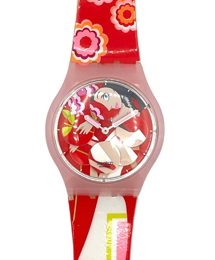 A Swatch kids' wristwatch featuring a red silicone strap with a retro floral pattern in pink, orange, and white, and a matching red dial with a cartoon character.