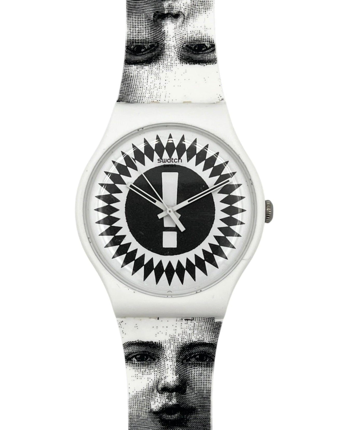 A Swatch wristwatch featuring a white case and strap with a black and white graphic print of faces. The watch dial is black with a white central bar and a black geometric border.
