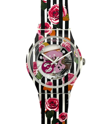 Watch with floral and striped strap on a white background