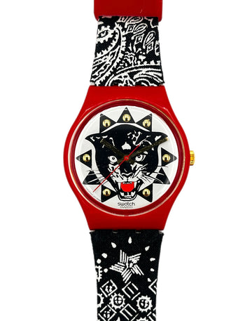 Watch with a red and black bandana-themed strap and a black panther design on the face.