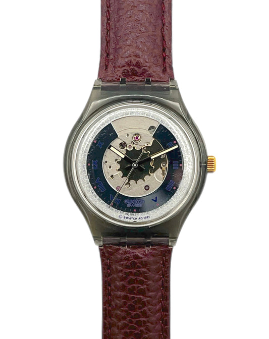 Watch with a brown leather strap on a white background