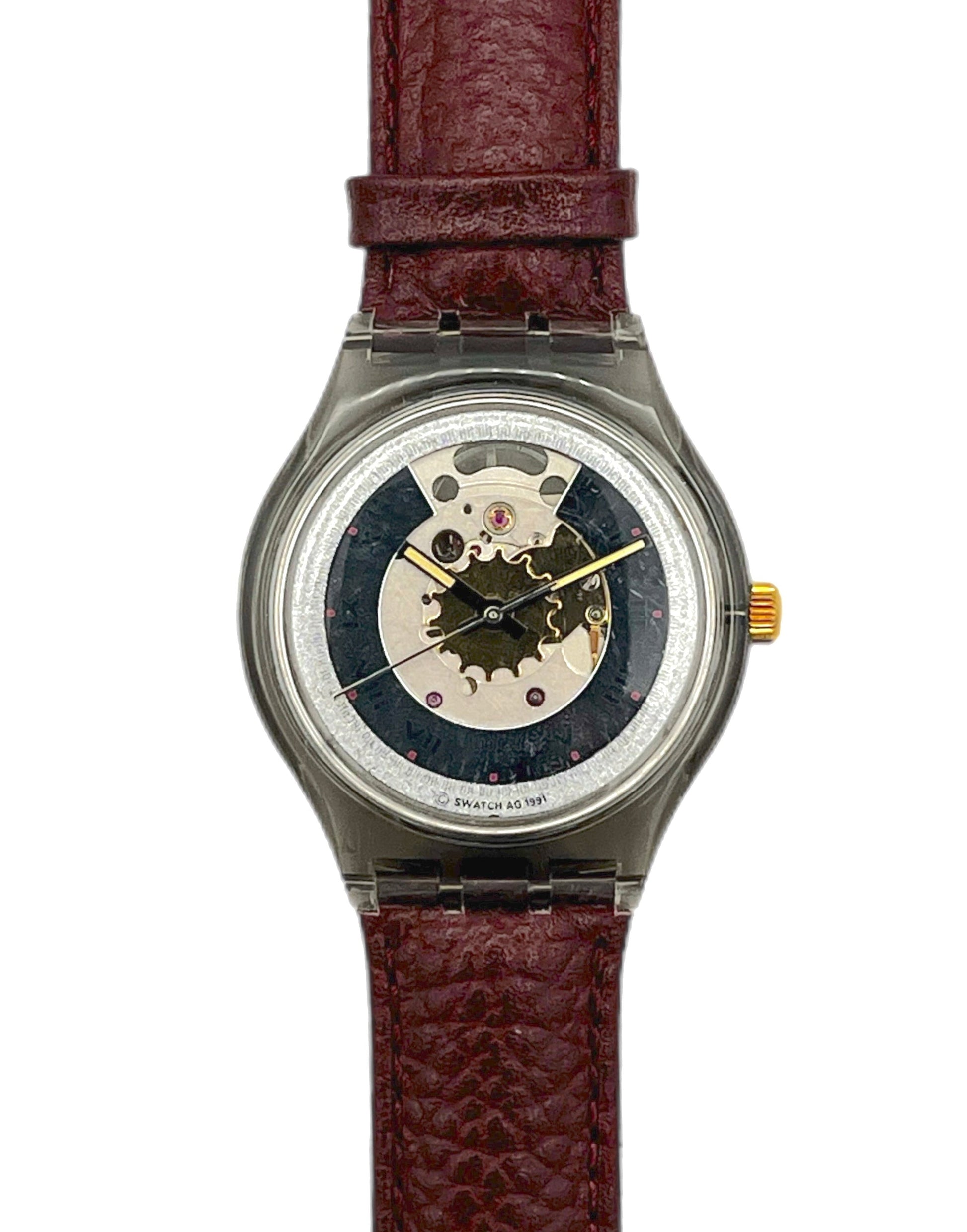 Watch with a brown leather strap and visible mechanical components on a white background