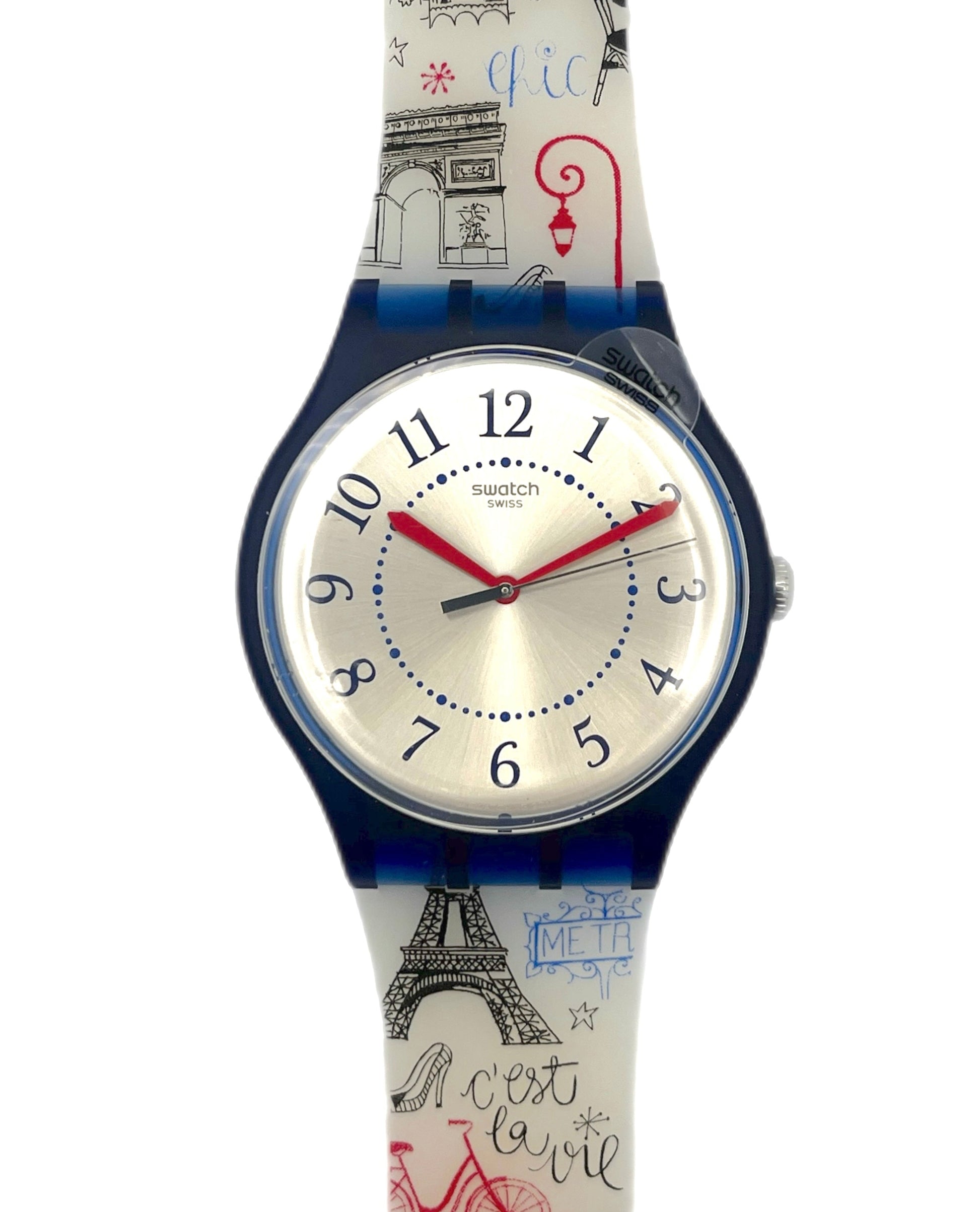 Watch with Paris-themed strap on a white background