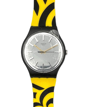 Watch with a yellow and black patterned strap on a white background
