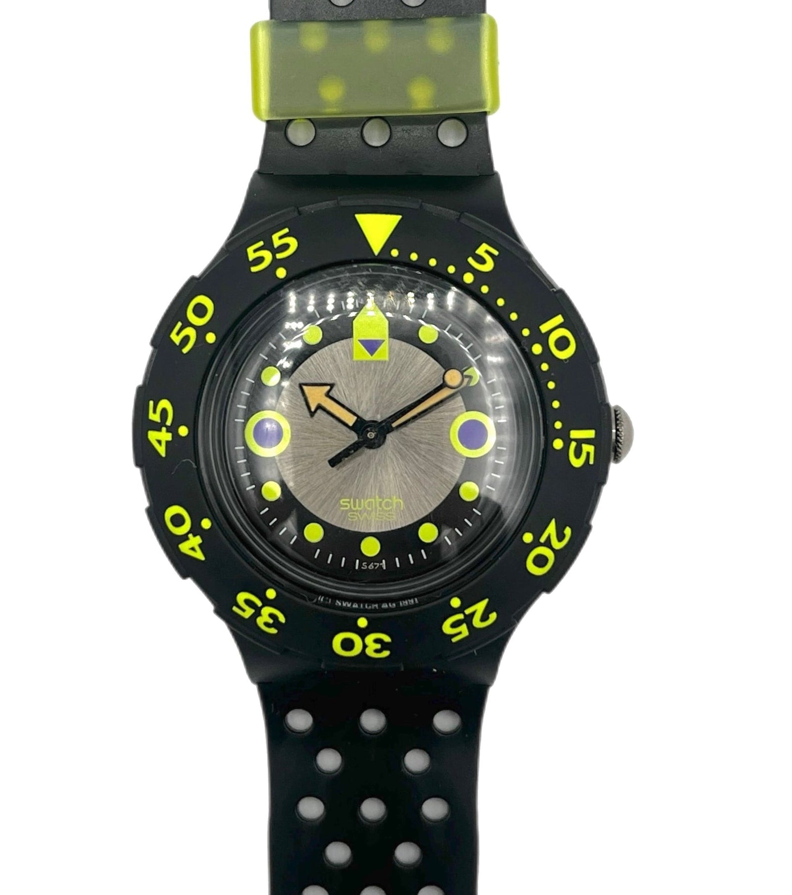 Black and green watch with a white background