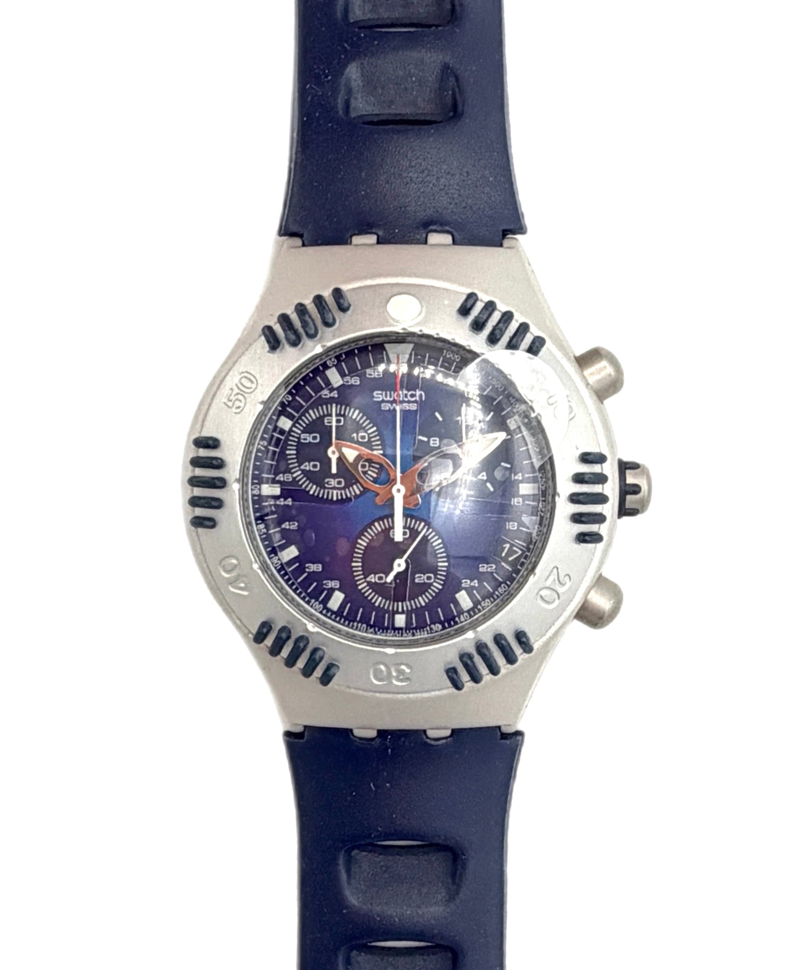 Swatch Swatch 62 wristwatch featuring a silver-tone stainless steel case, a dark blue dial with orange accents, and a dark blue silicone strap, shown against a plain white background.