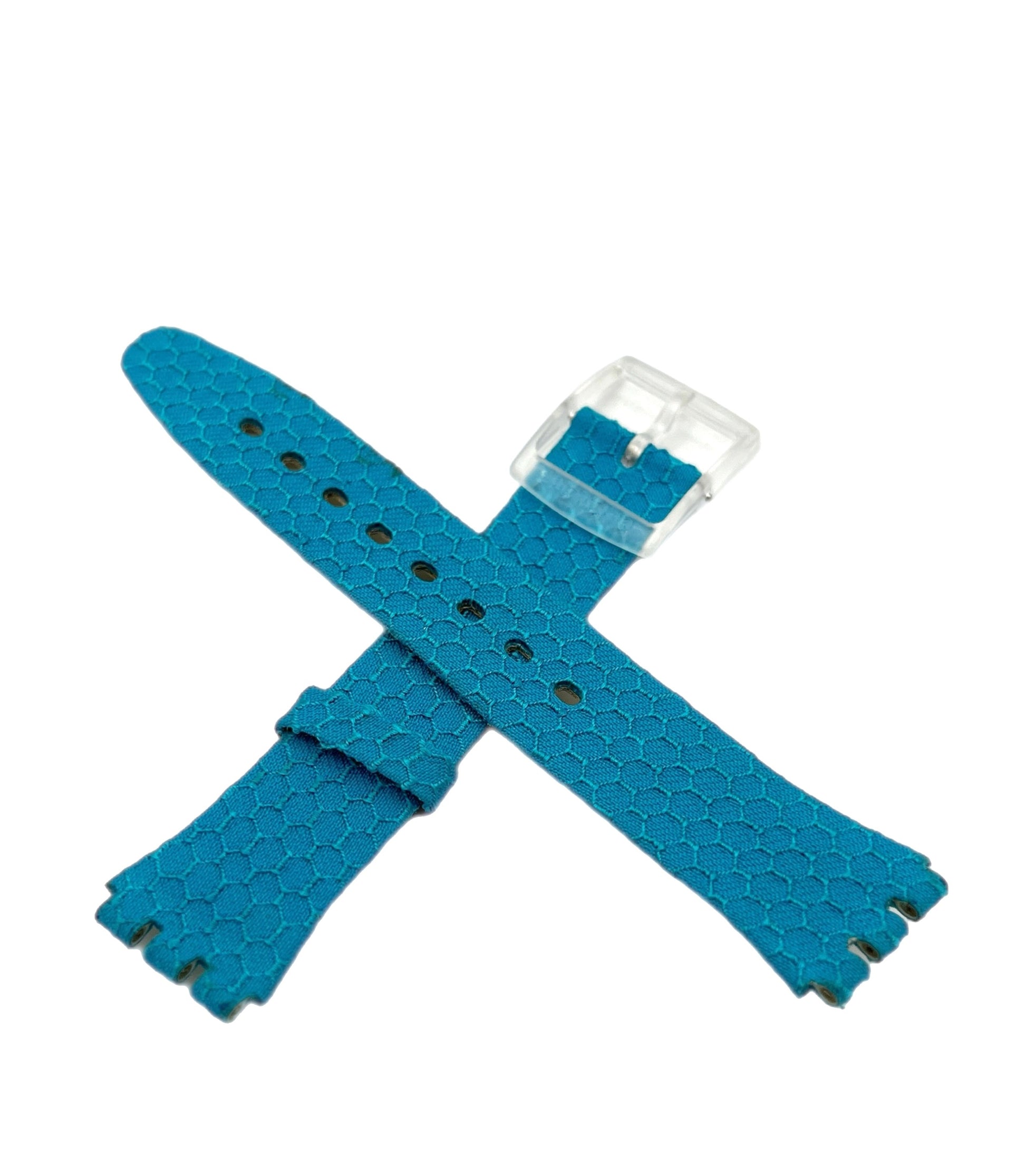 Blue textured watch strap on a white background