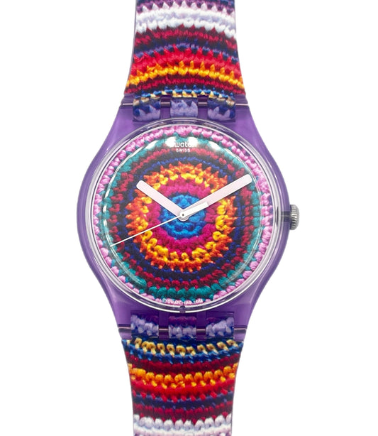 Colorful watch with a patterned strap on a white background