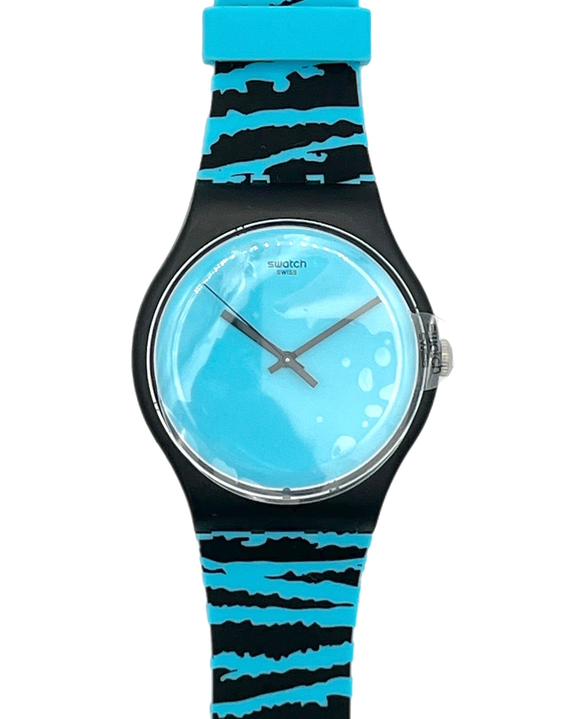 Swatch watch with a black case, light blue dial, and a black and blue patterned silicone strap, shown against a plain white background.