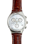 Watch with a brown leather strap on a white background