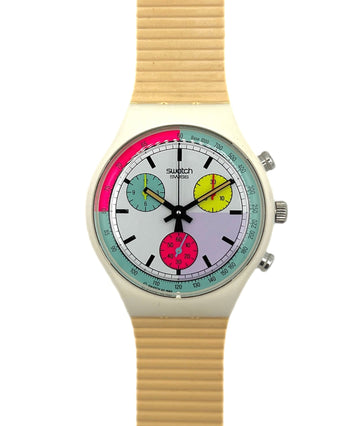 Swatch watch with a colorful face and beige strap on a white background