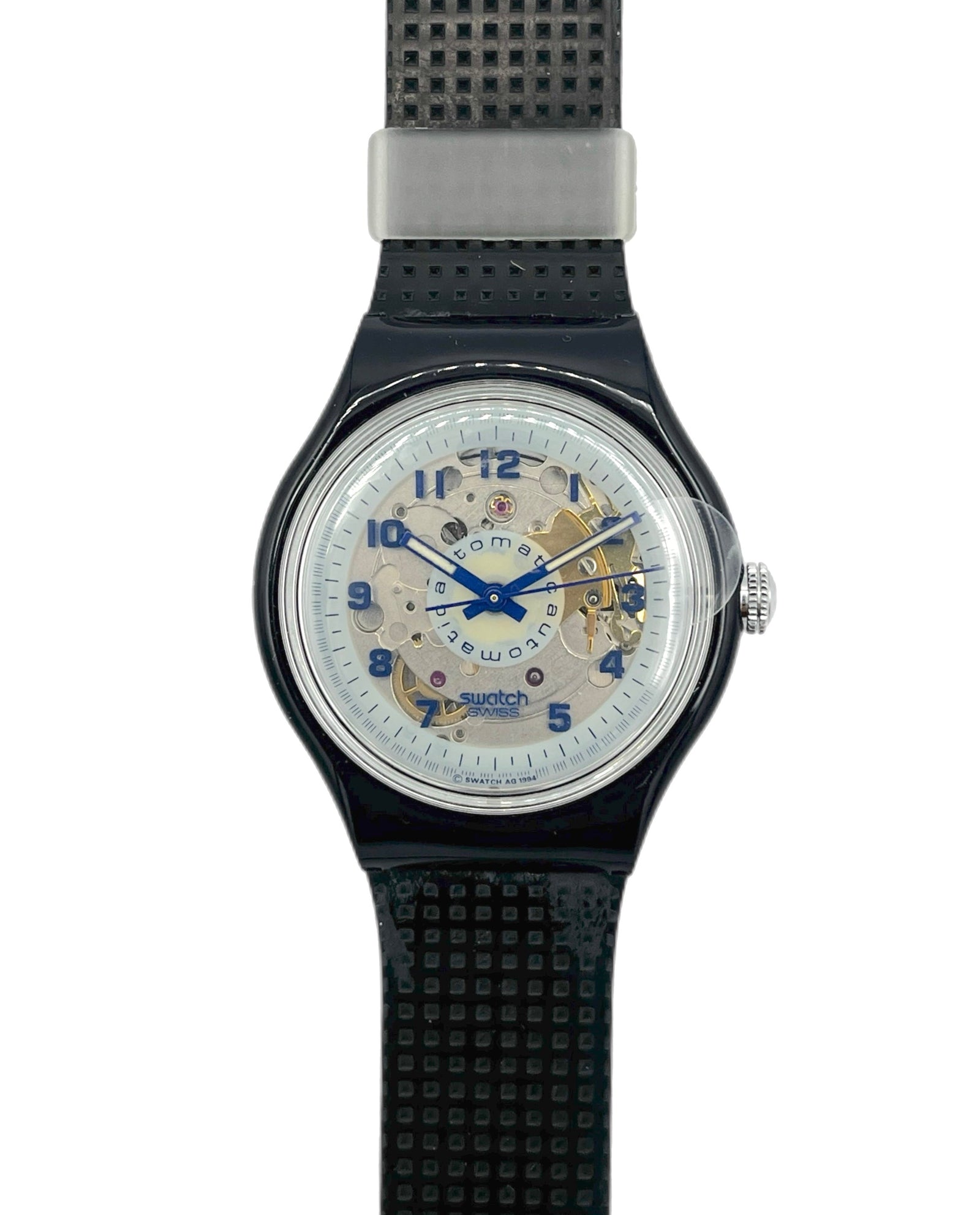 Swatch watch with black strap and white face on a white background