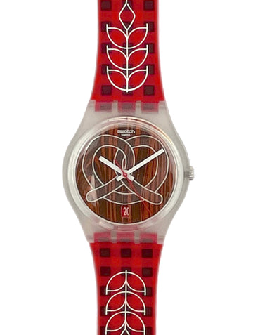 Swatch watch with red and black checkered strap and wooden face on a white background