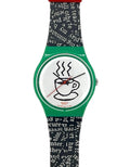 A Swatch wristwatch featuring a green case, a white dial with a black coffee cup illustration, and a black and white patterned strap.