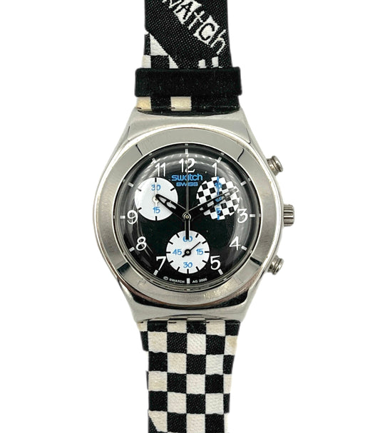 Swatch watch with black and white checkered strap on a white background