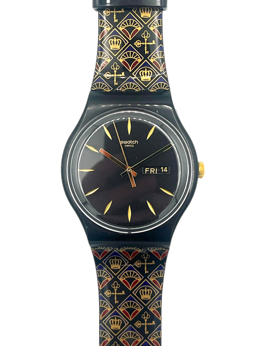Swatch watch with patterned strap on a white background