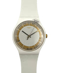 White Swatch watch with gold accents on a white background