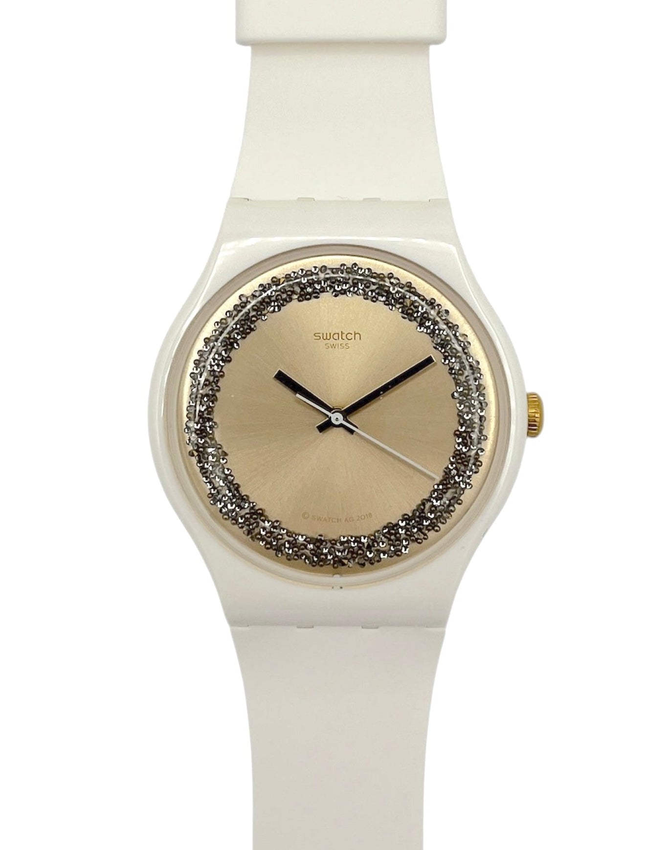 White Swatch watch with decorative face on a white background