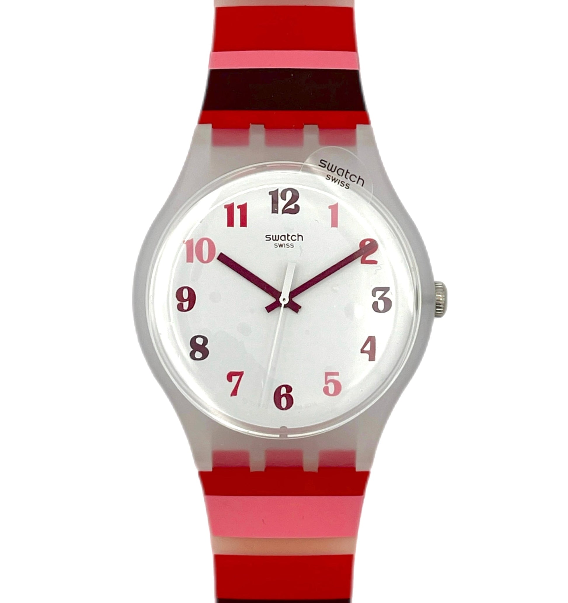 Swatch watch with a red and pink striped strap on a white background