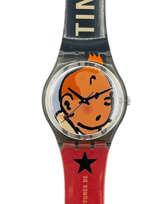 Watch with cartoon character face on the dial and red strap with star design