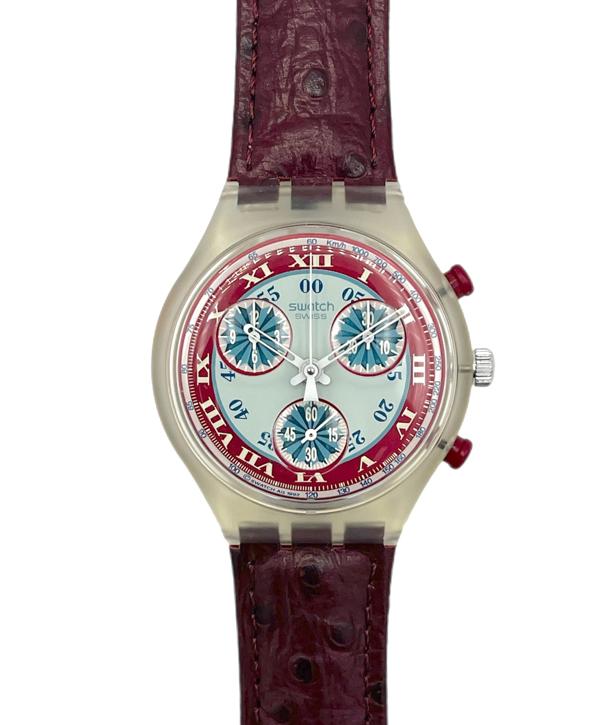 Watch with a red and silver face on a white background