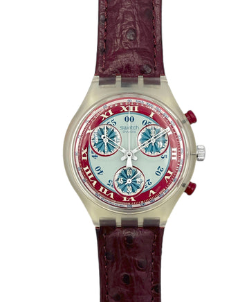 Watch with a red and silver face on a white background
